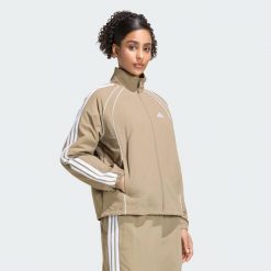 Kultowa bluza dresowa z tkaniny z 3 paskami. Zielone bluzy damskie Adidas, l, bez wzorów, z dresówki, bez kaptura. Za 329.00 zł.