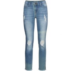 Dżinsy SKINNY z ćwiekami bonprix niebieski bleached. Jeansy damskie marki bonprix. Za 79.99 zł.