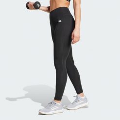 Długie legginsy Optimé Essentials Stash Pocket. Czarne legginsy damskie Adidas, xs, bez wzorów, z elastanu, z podwyższonym stanem, długie, na fitness i siłownię. Za 153.99 zł.