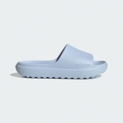 Klapki Adilette Lumia. Niebieskie klapki męskie Adidas, z materiału, klasyczne. Za 111.99 zł.