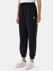 Adidas Spodnie dresowe Essentials Small Logo JD7999 Czarny Loose Fit. Czarne spodnie dresowe damskie Adidas, s, bez wzorów, z bawełny. Za 199.99 zł.