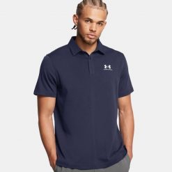 Koszulka polo męska Under Armour UA Icon. Niebieskie buty sportowe męskie Under Armour, bez zapięcia, na golfa. Za 199.99 zł.