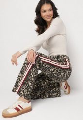 Beżowo-Brązowe Jeansy z Bawełny o Szerokim Kroju Ozdobione Lampasami Eliniae. Brązowe jeansy damskie Born2be. Za 119.99 zł.