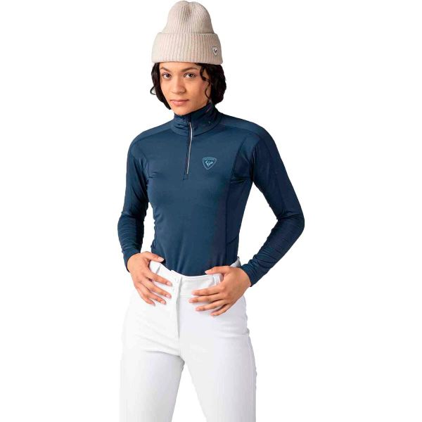 Koszulka termoaktywna Rossignol W Classique 1/2 Zip. Niebieskie koszulki sportowe damskie Rossignol, m, bez wzorów, bez kołnierzyka, bez ramiączek, narciarskie. Za 404.25 zł.