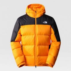 Kurtka puchowa The North Face Diablo Down Hoodie pomarańczowo-czarna. Czarne kurtki męskie The North Face, bez wzorów, z puchu, sportowe, z kapturem. W wyprzedaży za 824.30 zł.