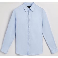 Koszula regular fit - Niebieski. Niebieskie koszule męskie Reserved. Za 139.99 zł.
