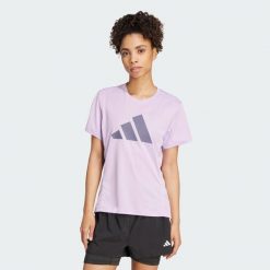Koszulka Run It. Czerwone koszulki sportowe damskie Adidas, m, bez wzorów, sportowe, bez kołnierzyka. W wyprzedaży za 94.17 zł.