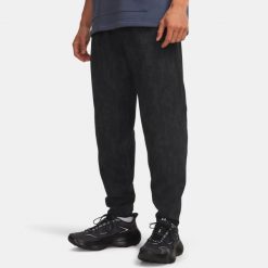 UA Unstoppable Fleece Spodnie Męskie Czarne. Czarne spodnie sportowe męskie Under Armour, l, bez wzorów, z bawełny, na fitness i siłownię. Za 599.99 zł.