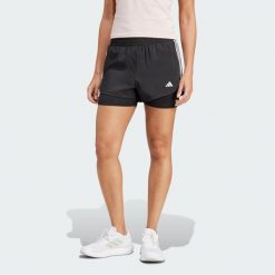 Szorty Pacer 3-Stripes Training Woven. Czarne obuwie sportowe damskie Adidas, xs, bez wzorów, z materiału, sportowe, na fitness i siłownię. Za 179.00 zł.