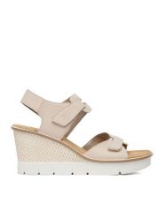 Rieker Sandały 68556-31 Beżowy. Brązowe sandały damskie Rieker, bez wzorów, ze skóry, bez obcasa, na koturnie, bez zapięcia. Za 349.99 zł.