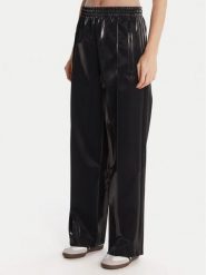 Adidas Spodnie dresowe adicolor Holiday JV7503 Czarny Loose Fit. Czarne spodnie dresowe damskie Adidas, m, bez wzorów, z dresówki. Za 399.99 zł.