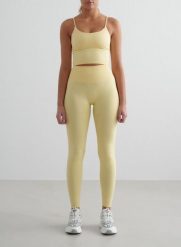 Damskie legginsy bezszwowe, wysoki stan, squat proof petite Shape żółty mellow. Żółte legginsy damskie Aim'n, m, bez wzorów, z elastanu, z podwyższonym stanem, na fitness i siłownię. Za 296.00 zł.
