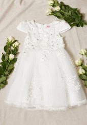 Biała Sukienka z Tiulowym Dołem Ozdobiona Kwiatkami Karemia. Białe sukienki dla dziewczynek Born2be, z aplikacjami, z koronki, eleganckie, bez ramiączek. Za 34.99 zł.