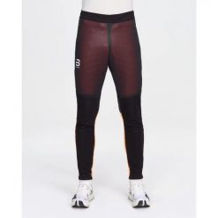 Spodnie narciarskie Daehlie Sportswear Thermo Pro. Czarne spodnie snowboardowe męskie DAEHLIE, l, bez wzorów, z materiału, narciarskie. Za 800.50 zł.