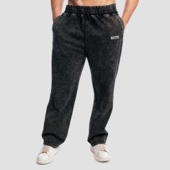 Spodnie dresowe męskie oversize z efektem sprania czarne Aura. Czarne spodnie sportowe męskie GYMBEAM, m, bez wzorów, z bawełny, na fitness i siłownię. Za 139.90 zł.