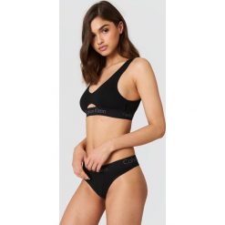 Calvin Klein Stringi Cotton - Black. Czarne stringi damskie Calvin Klein, z bawełny. Za 80.95 zł.