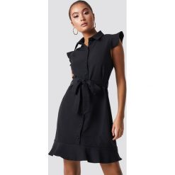 Trendyol Sukienka z detalami Tofa - Black. Czarne sukienki damskie Trendyol, z materiału. Za 121.95 zł.