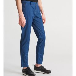 Chinosy slim fit - Granatowy. Spodnie materiałowe męskie marki Reserved. Za 129.99 zł.