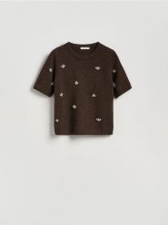 Sweter z błyszczącą aplikacją - brązowy. Brązowe swetry damskie Reserved, l, z aplikacjami, z dzianiny, bez kołnierzyka, bez ramiączek, bez kaptura. Za 119.99 zł.