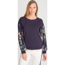 BLUZA LIU JO. Niebieskie bluzy damskie Liu Jo, l, z aplikacjami, z bawełny, bez kaptura. Za 468.30 zł.