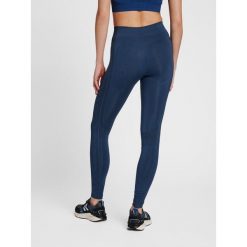 Damskie legginsy mid-rise Hummel Shaping. Niebieskie legginsy damskie Hummel, xs, bez wzorów, z dzianiny, do siatkówki. Za 161.00 zł.