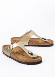 BIRKENSTOCK GIZEH BF Klapki damskie. Żółte klapki damskie Birkenstock, bez wzorów, z materiału, eleganckie, bez obcasa. Za 349.99 zł.
