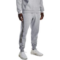 Spodnie sportowe męskie Under Armour Rival. Szare spodnie sportowe męskie Under Armour, l, bez wzorów, z bawełny, do piłki nożnej. Za 149.99 zł.
