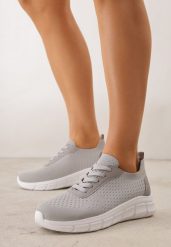 Szare Minimalistyczne Buty Sportowe z Siateczki na Tłoczonej Podeszwie Zanera. Szare obuwie sportowe damskie Born2be, bez wzorów, z jeansu, na fitness i siłownię. Za 79.99 zł.