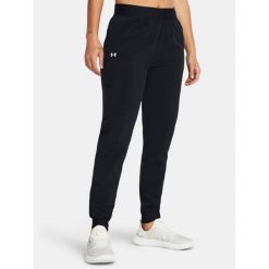 Spodnie treningowe damskie Under Armour Sport High Rise Woven. Czarne obuwie sportowe damskie Under Armour, m, bez wzorów, na fitness i siłownię. Za 189.99 zł.
