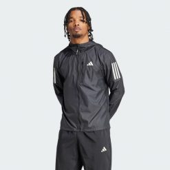 Kurtka Own The Run. Niebieskie buty sportowe męskie Adidas, l, bez wzorów, bez kaptura. Za 349.00 zł.