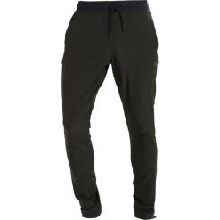 Under Armour SPORTSTYLE ELITE Spodnie materiałowe artillery green. Spodnie sportowe męskie marki Under Armour. W wyprzedaży za 356.15 zł.