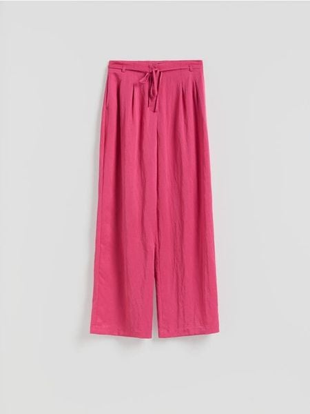 Luźne spodnie z lyocellem - różowy. Czerwone spodnie materiałowe damskie Reserved, l, bez wzorów, z lyocellu. Za 139.99 zł.