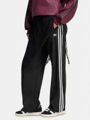 Adidas Spodnie dresowe 2In1 Firebird Loose Track Trousers With Lace Skirt LG4271 Czarny Relaxed Fit. Czarne spodnie dresowe damskie Adidas, m, bez wzorów, z dresówki. Za 369.99 zł.