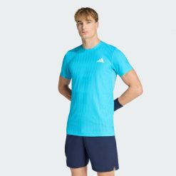 Koszulka Tenisowa Climacool+ Airchill Freelift. Niebieskie koszulki sportowe męskie Adidas, bez wzorów, bez kołnierzyka, bez ramiączek, tenisowe, climacool (adidas). Za 259.00 zł.