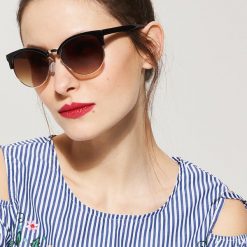 Okulary przeciwsłoneczne - Brązowy. Okulary przeciwsłoneczne damskie marki QUECHUA. Za 29.99 zł.