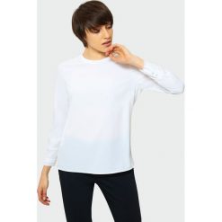 Elegancka biała bluzka. Bluzki damskie marki Greenpoint. Za 39.99 zł.