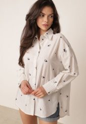 Biało-Niebieska Koszula na Lato z Bawełny o Kroju Oversize w Paski i Haftowany Wzór Deinaris. Białe bluzki damskie Born2be, bez wzorów, z bawełny, eleganckie, bez kołnierzyka, bez ramiączek. Za 119.99 zł.