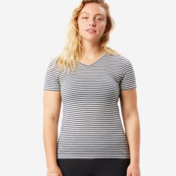 Koszulka trekkingowa damska Simond Travel 500 merino. Białe koszulki sportowe damskie SIMOND, l, bez wzorów, z materiału, bez kołnierzyka, bez ramiączek, trekkingowe. Za 99.99 zł.