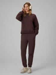 4F Spodnie dresowe joggery damskie - brązowe M. Brązowe spodnie dresowe damskie 4f, m, bez wzorów, z dresówki. Za 129.99 zł.