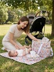 Torba do wózka z akcesoriami z motywem kwiatowym - wielobarwny. Torby i plecaki dziecięce Sinsay. Za 69.99 zł.