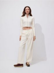 Szerokie spodnie dresowe - jasnożółty. Żółte spodnie dresowe damskie Reserved, l, bez wzorów, z bawełny. Za 99.99 zł.