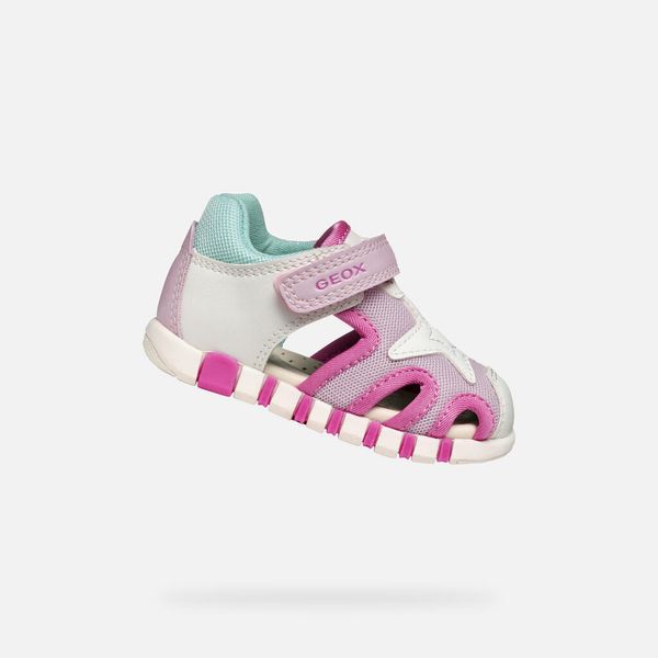 Sandały GEOX B SANDAL IUPIDOO GIR Biały. Białe sandały damskie Geox, bez wzorów, z syntetyku, bez obcasa, bez zapięcia. Za 189.99 zł.