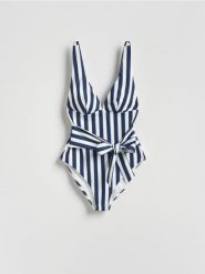 Jednoczęściowy strój kąpielowy - granatowy. Niebieskie kostiumy jednoczęściowe damskie Reserved, bez wzorów. Za 129.99 zł.