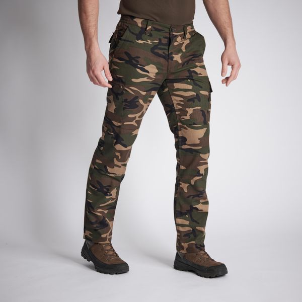 Spodnie Solognac Steppe 300 camo wytrzymałe. Zielone spodnie sportowe męskie SOLOGNAC, l, bez wzorów, z bawełny, outdoorowe. W wyprzedaży za 69.99 zł.