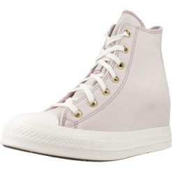 Buty CONVERSE CHUCK TAYLOR ALL STAR WEDGE Fioletowy. Fioletowe obuwie sportowe damskie Converse, bez wzorów, z tkaniny. Za 387.99 zł.