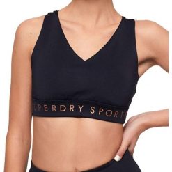 Top sportowy damski Superdry Active Studio. Niebieskie obuwie sportowe damskie Superdry., bez wzorów, na fitness i siłownię. Za 123.05 zł.