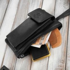 Paolo Peruzzi Saszetka męska skórzana do ręki czarna T-90-BL. Czarne saszetki męskie Paolo Peruzzi. Za 155.19 zł.