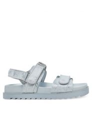 Guess Sandały FLJFDS LEL03 Niebieski. Niebieskie sandały damskie Guess, z aplikacjami, ze skóry, bez obcasa, na płaskiej podeszwie, bez zapięcia. Za 499.99 zł.