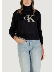 Calvin Klein Jeans Sweter CHENILLE MONOLOGO SW Czarny Casual Fit. Czarne swetry damskie Calvin Klein Jeans, xl, bez wzorów, z jeansu, casualowe, bez kołnierzyka, bez ramiączek, bez kaptura. Za 429.99 zł.