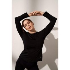 Longsleeve do jogi Moonholi Energy z długim rękawem. Czarne koszulki sportowe damskie MOONHOLI, s, bez wzorów, sportowe, bez kołnierzyka. Za 329.00 zł.